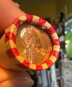 Full roll of wheat Pennie’s with BU 1957 D end coin