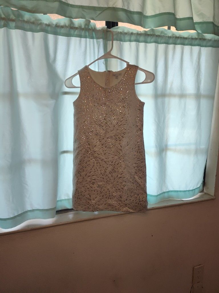 Beautiful Cream With Metallic Embellishments