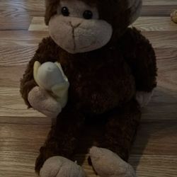 Sweet Little Monkey Plush Holding A Banana