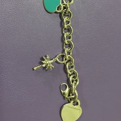 Sterling Silver Tiffiny Bracelet with 2 added charms