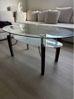 2-tier Oval Glass Coffee Table by Ashley Furniture