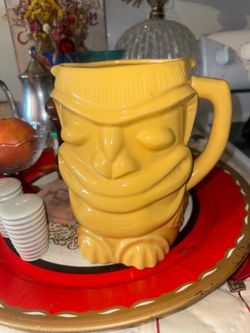 Antique Tiki Yellow Pitcher