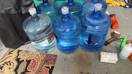 10 Ozarka 5 gallon water bottles