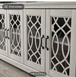 Create an inviting focal point in your living room with this Transitional TV Stand, a stylish entertainment centre that blends decorative design with