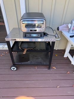 Ninja Artisan Outdoor Electric Oven - Includes rolling stand, cover, cooking pan and pizza peel