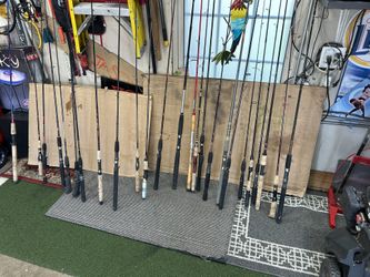 Fishing poles, all different brands brand new some antiques 26 of them altogether