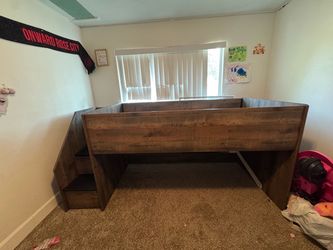 Almost brand new bed with mattress and cabinets