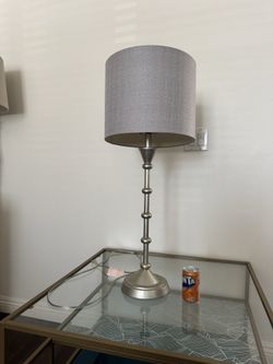 Tall bedside table lamp with grey shade