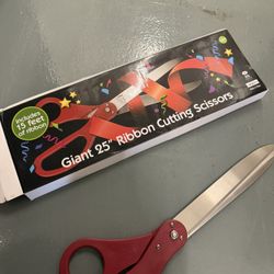 Giant Scissors And A Ribbon