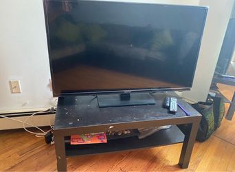 Element Flat Screen TV with coffee table