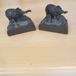 pair of antique bronzed metal mini elephant bookends.