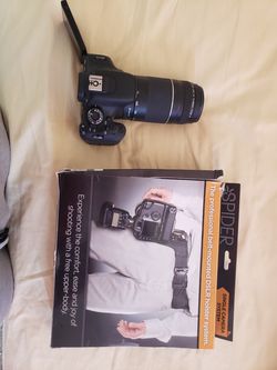 Rebel T3I complete with batery.charger.hip haulster. It's only been used 4 times works great. Hip haulster is brand new never been used!