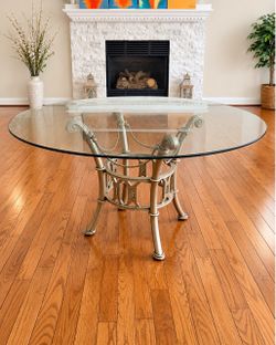Elegant Glass Top Dining Table – Decorative Metal Base