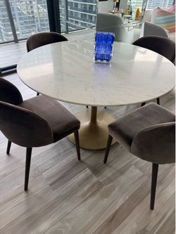 Crate and Barrel marble dining table with 4 wood chairs