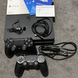 PS4 (500 GB HDD) + 2 CONTROLLERS OBO Like New  Asking $200 OBO