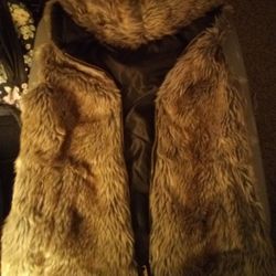 Woman's brown fur sleeveless zipup jacket