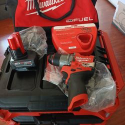 12v Fuel 1/2  Hammer Drill Drive And Battery 4 0ah And Charger With Bag  