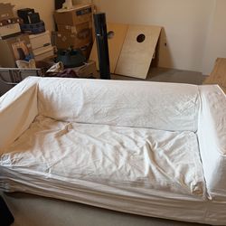 Covered IKEA loveseat couch