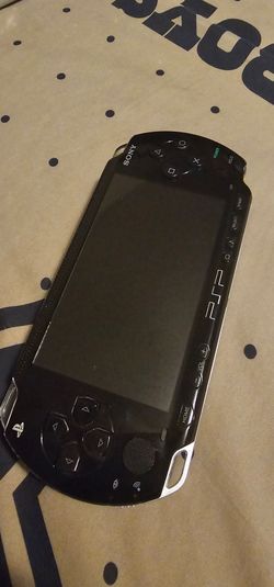 PSP with 4games 4movies