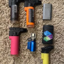 A collection of lighters, all in good condition.