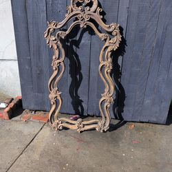 large, ornately carved wood wall mirror Frame  in the Rococo style, 