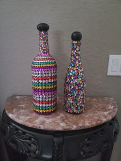 2 Decorative Bottles.