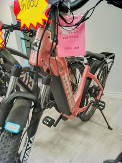 Hovsco skinny tire city ebike pink and bronze