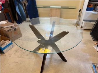 Round glass top dining table