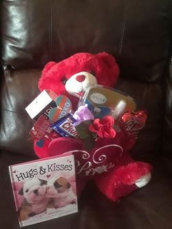 Valentine's day bear with amope PEDI perfect along with perfume and full sized candy as well as a book card