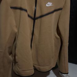 Gold nike tech fleece (used but still looks new)