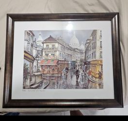 This framed art print depicts a street scene of the Montmartre district in Paris