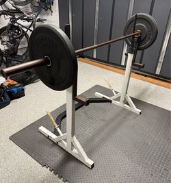 Squat Rack, bar and 2 Rubber Plates