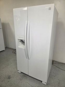 Kenmore refrigerator side by side