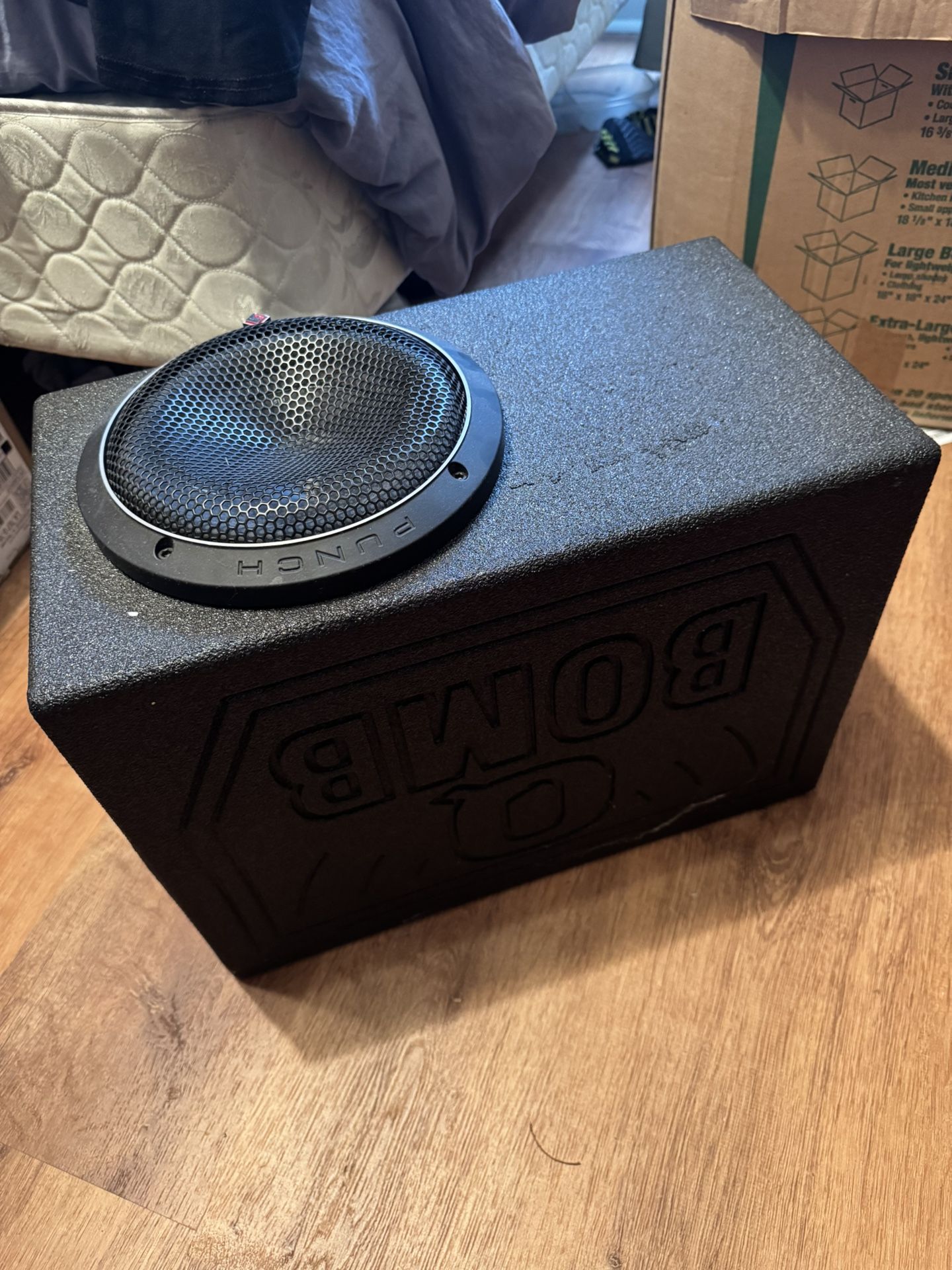 Rockford 12” Subwoofer In RQB12 Qbomb single 12" vented enclosure With Dual 4 Channel Amp With 2500W Gravity 4 Gauge Wire