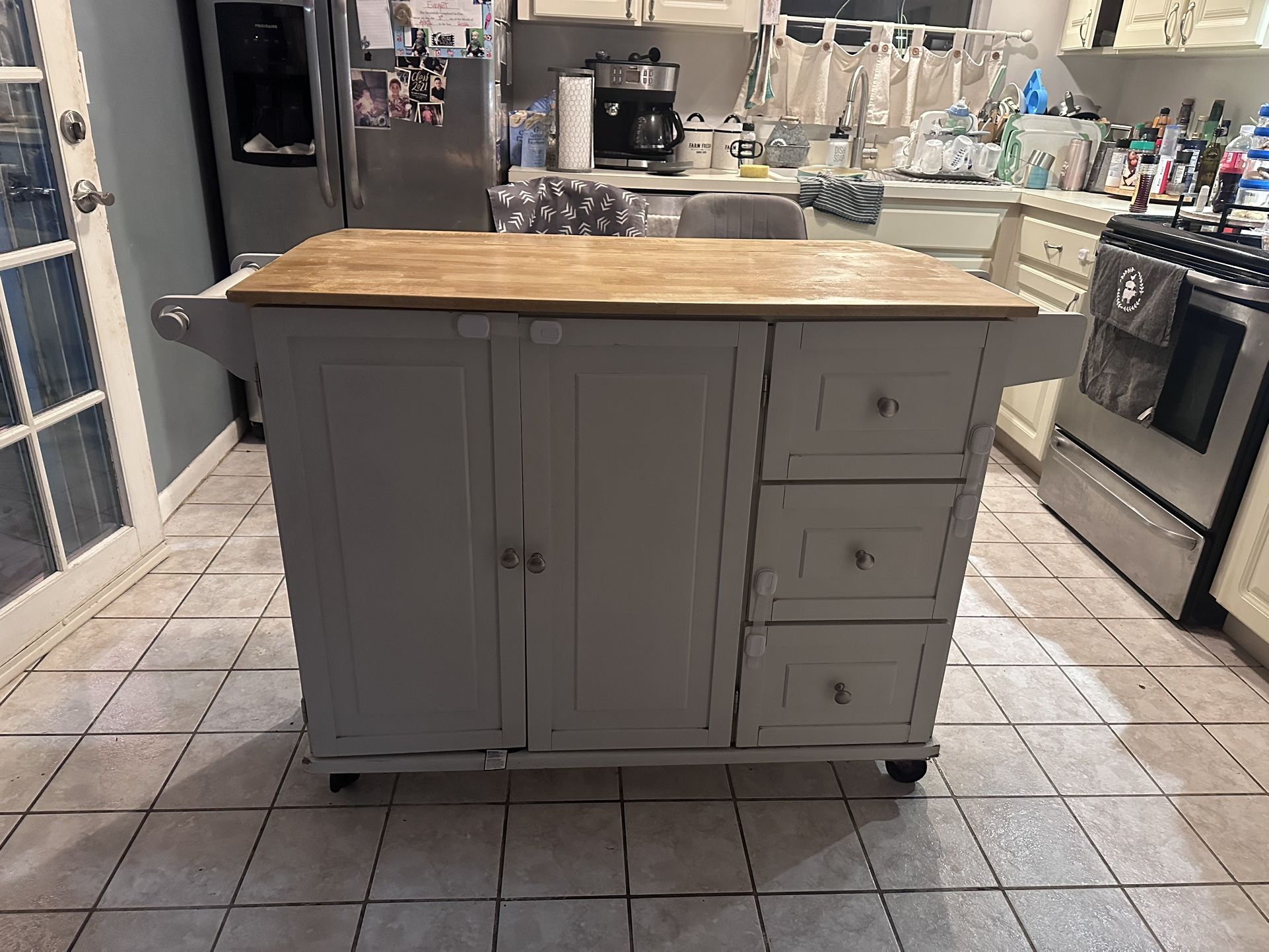 Kitchen Island With Cabinets with two bar grey stools And Drawers