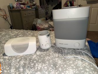 Bottle sterilizer bottle warmer and wipe warmer