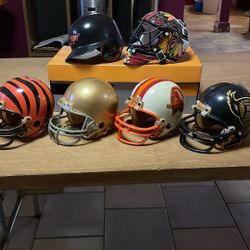 Assortment Of Mini Helmets Sold $12 Apiece Or $ 50 For Alll Together 
