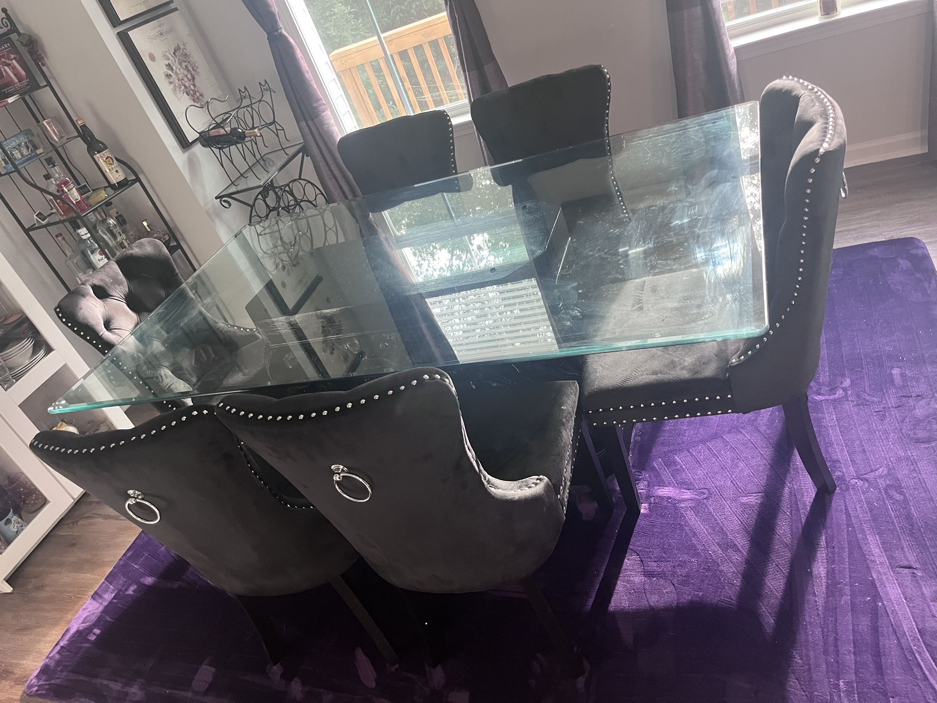 ELEGANT ORNATE BLACK BASE GLASS TABLE TOP DINING SET WITH 6 CHAIRS