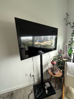 Two 50” TVs