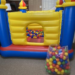 Used Twice Like New Bouncy House With 200 Balls!