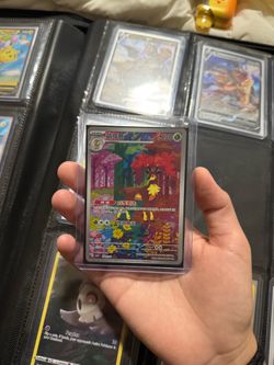 Pokémon Trading Card Collection w/ ETB, 2 Binders, and CGC Pristine 10 Jap Charizard Ex