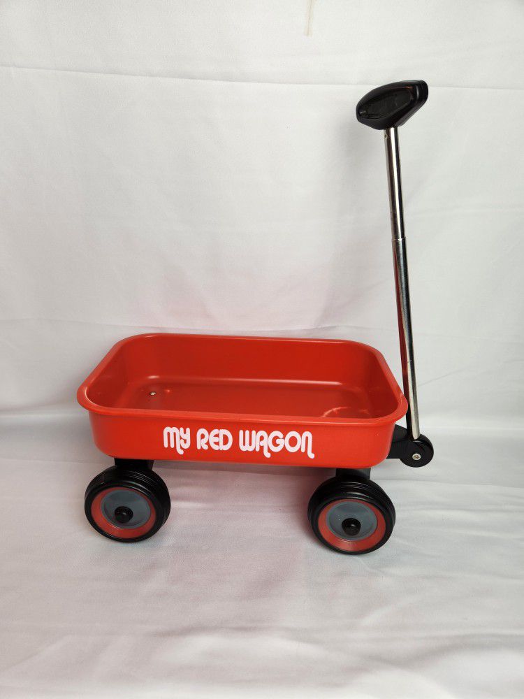 My Little Red Wagon like new 12" X 8". Like new condition make of plastic and metal.  