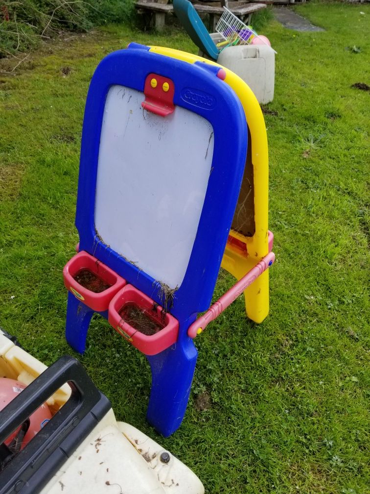 Children's art easel excellent condition needs cleaning chalkboard on one side painting on the other