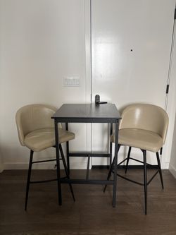 Two Swivel Bistro Chairs And Square Bistro Table