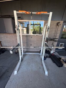 Fitness equipment: half rack combo, pull up bar, dip bar, deadlift cage, x2 Olympic, curling bar, plates