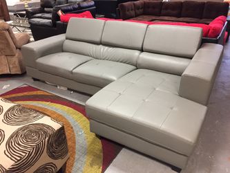 BRAND NEW SECTIONAL SOFA WITH ADJUSTABLE HEAD REST