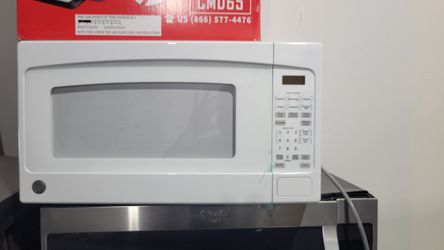 Ge 24 " Ober The Counter White Microwave 