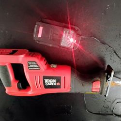 Cordless Black & Decker Sawzalls with charger. + New battery