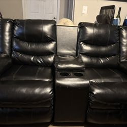 Two Black Leather Sofas