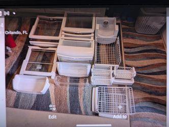 GE side by side refrigerator freezer 17 shelves and bins and drawers